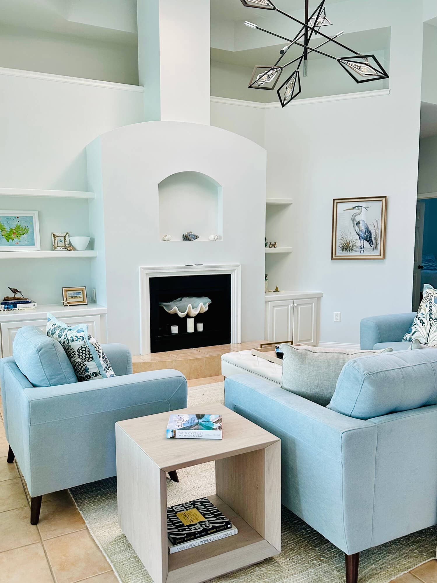 Spotless coastal living room with organized furnishings